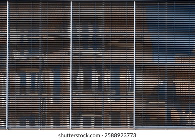 Reflection in window panes with blinds