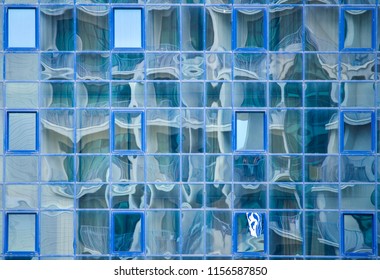 reflection in the windows of modern building