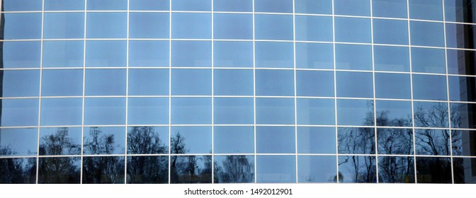 reflection in windows of modern building