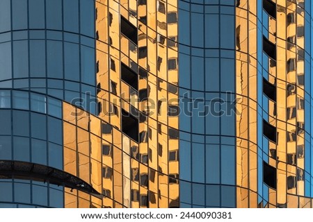 Reflection in windows of modern office building in Adelaide, South Australia