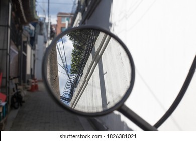 Reflections Of Blue Sky The Motorcycle Side Mirror.