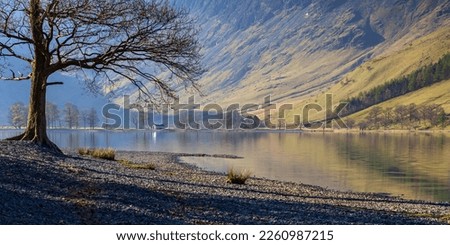 Reflections in Buttermere on a beautifully still spring morning in the Lake District National Park.