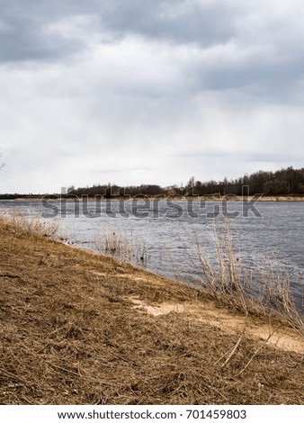 Similar – Image, Stock Photo sun-yellow houses are reflected in a stream…