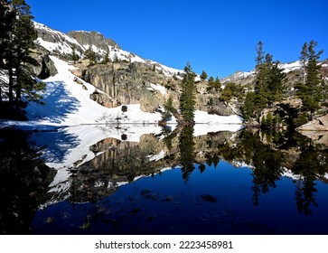 Reflections in Grass Lake, Desolation Wilderness, California.
				