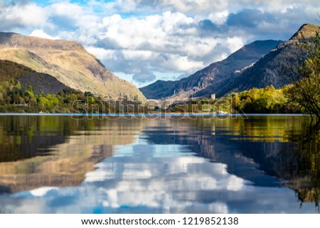 Reflections at Llyn Padarn with Dolbadarn Castle at Llanberis in Snowdonia National Park in background - Wales - United Kingdom