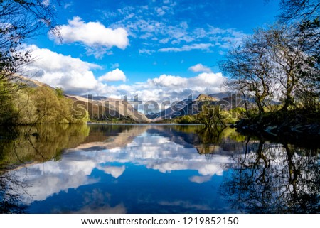 Reflections at Llyn Padarn with Dolbadarn Castle at Llanberis in Snowdonia National Park in background - Wales - United Kingdom