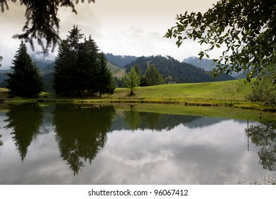 reflections on Lac Des Joncs in Switzerland