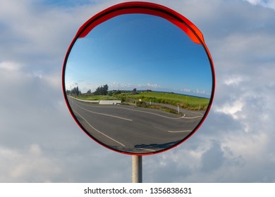 Reflections of the road on traffic mirror for traffic safety - Powered by Shutterstock