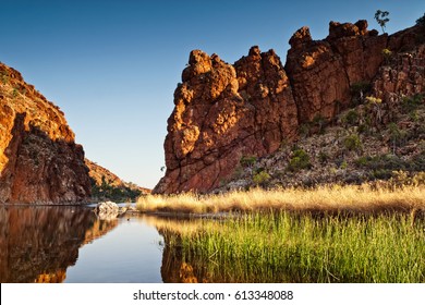 Reflections Of Rock Formations At Glen Helen Gorge Water Hole In Northern Territory Central Australia