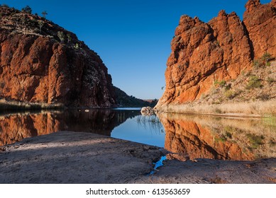 Reflections Of Rock Formations At Glen Helen Gorge Water Hole In Northern Territory Central Australia