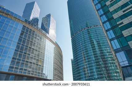reflections of skycrapers in another skyscraper of moscow city