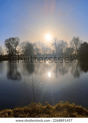 reflections of the sun on the alake  Stock fotó © 