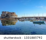 Reflections in the water around the Fort at Toulon, France