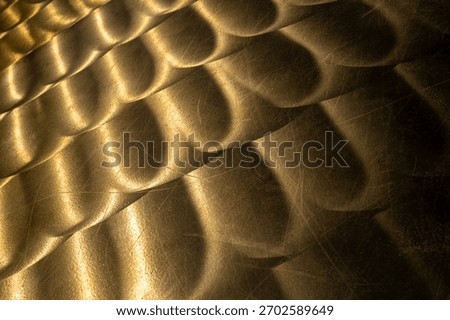 Reflective pattern on a bronze ship propeller.