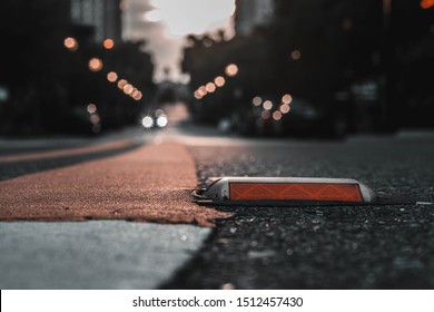 Reflector On The Road During Sunset