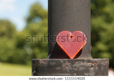 Reflector in the shape of the heart, on a sunny day. Valentine's Day. Valentine Love and heart. Copy space.