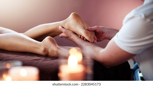 Reflexology Feet Massage Treatment. Foot Spa Therapist - Powered by Shutterstock