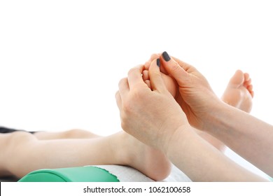 Reflexotherapy, Child's Foot Acupressure. The Masseur Performs A Point Massage Of The Child's Foot