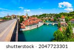 Reformed Nydeggkirche church and Aare river aerial panoramic view in the Old City of Bern in Switzerland