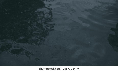 Refraction of light from the sun into a pool of clear spring water