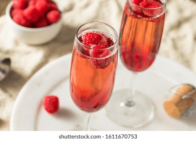 Refreshing Alcoholic Kir Royale with Champagne Raspberries