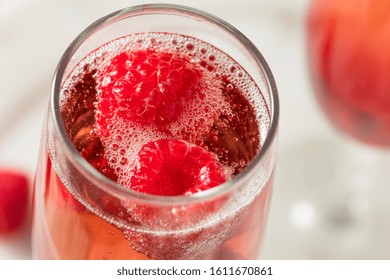 Refreshing Alcoholic Kir Royale with Champagne Raspberries