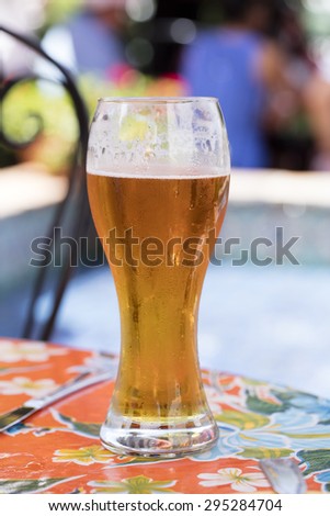 Refreshing beer ordered before dinner at a local restaurant