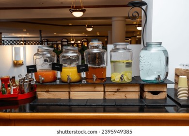 Refreshing Beverage Selection at Breakfast Buffet with Infused Waters and Juices