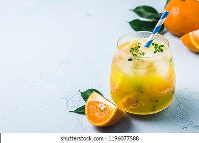 Refreshing Clementine Mocktail In Glass. Selective Focus, Space For Text.