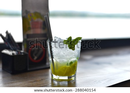 Refreshing cocktail in a summer bar