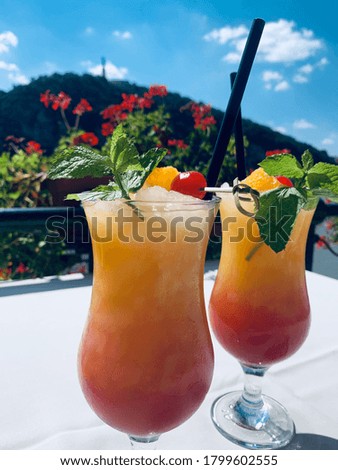 Refreshing coctails with ice cubes