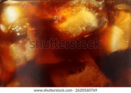 Refreshing coffee with ice cubes as background, closeup