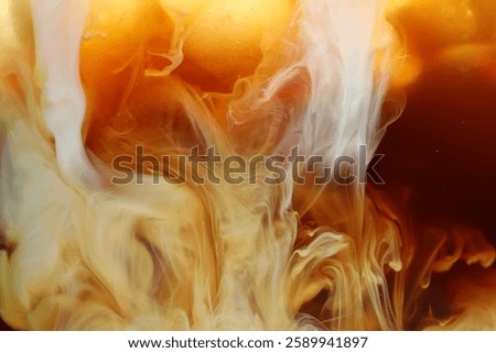 Refreshing coffee with ice and milk as background, closeup