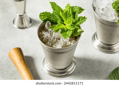 Refreshing Cold Iced Mint Julep Cocktail with Bourbon for the Derby