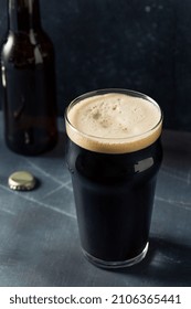 Refreshing Cold Irish Stout Beer in a Pint Glass