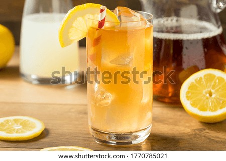 Refreshing Cold Lemonade and Iced Tea with a Lemon