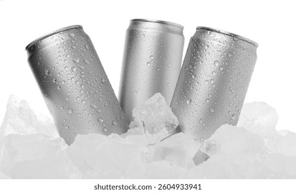 Refreshing drinks in cans on ice cubes against white background