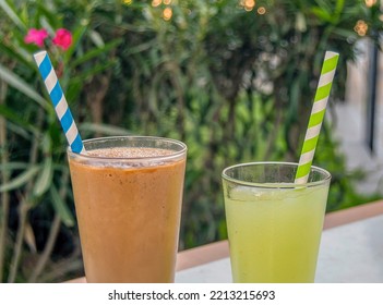 Refreshing Drinks For The Summer, In This Case A Glass Of Lemon Slush And Another With A Mixture Of Horchata And Slush Coffee