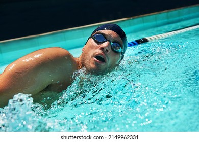 Refreshing Exercise. A Swimmer In A Pool.