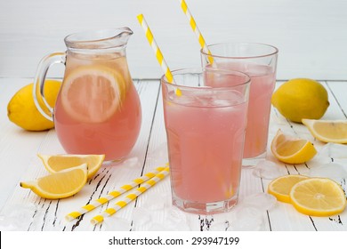 Refreshing Homemade Pink Lemonade On White Old Vintage Wooden Background