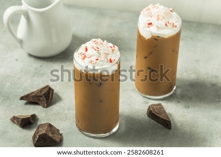 Refreshing Iced Cold Peppermint Mocha Coffee with Whipped Cream