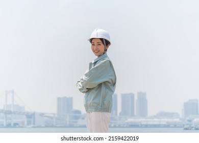 A Refreshing Japanese Woman In Work Clothes