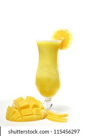 Refreshing Mango, Peach And Orange Smoothie On White Background