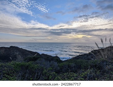 refreshing ocean panorama from sunset-lit cliffs