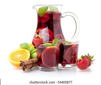 Refreshing sangria (punch) and fruits. Isolated on white