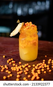 Refreshing Sea Buckthorn Cocktail. The Concept Of The Original Serving Of Soft Drinks.