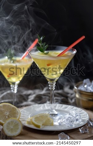 Refreshing summer alcoholic cocktail with crushed ice and citrus fruits