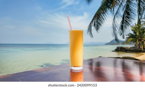 A refreshing tropical drink on a wooden bar overlooking a serene beach setting with palm trees and clear sea water, embodying a relaxed summer vacation vibe - Powered by Shutterstock