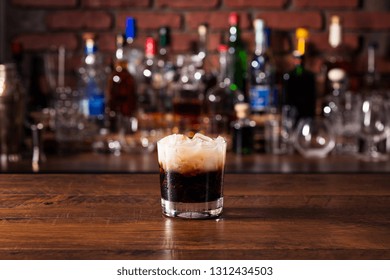 Refreshing White Russian Cocktail On A Bar