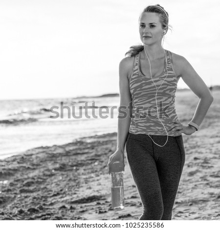 Similar – Two women walking by sea pier